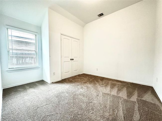 Third bedroom with window that provides natural light. | Image 21