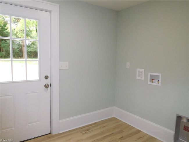 LARGE LAUNDRY ROOM/MUD ROOM OFF OF THE KITCHEN AT THE BACK DOOR. | Image 13