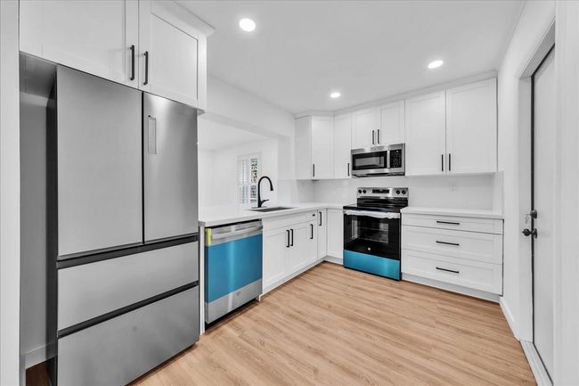 Newly Renovated with White Shaker Cabinets, Quartz Countertops & Stainless Steel Appliances | Image 6