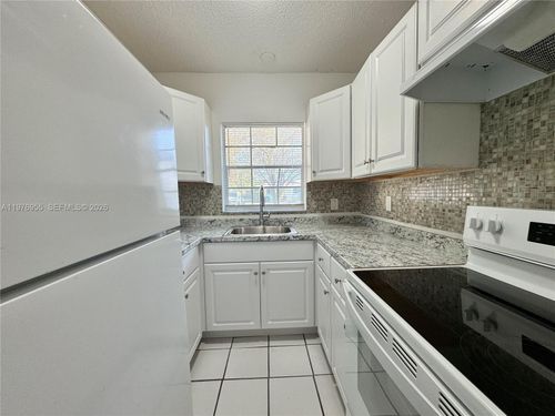 apt-107-4140 Woodside Dr, Coral Springs, FL, 33065-1951 | Card Image