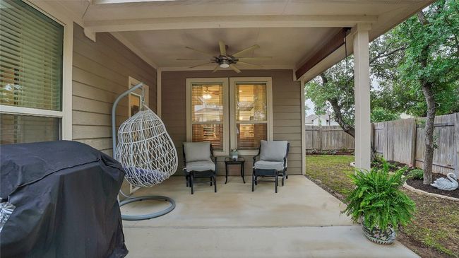 View of patio / terrace featuring a ceiling fan, a fenced backyard, and a grill | Image 27