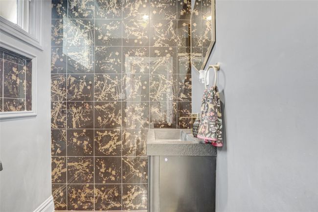 Bathroom featuring vanity | Image 12