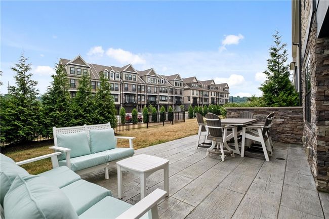 Open rear patio for dining and relaxing! | Image 44