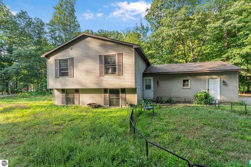 10583 Wildwood Rd, Interlochen, MI, 49643-9116 | Card Image