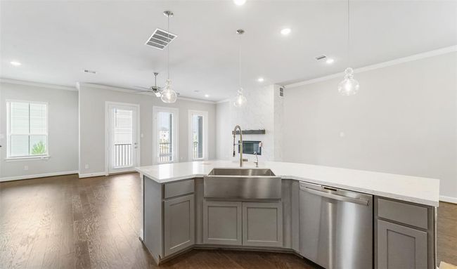 Curved island overlooking great room and dining area (*Photo not of actual home and used for illustration purposes only.) | Image 11