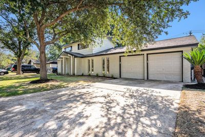 Double wide driveway in a quiet established community. | Image 3