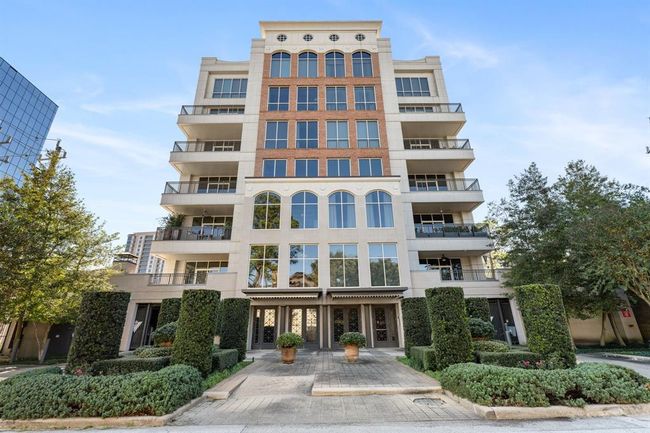 Building exterior located in a tucked away quiet residential neighborhood. | Image 33