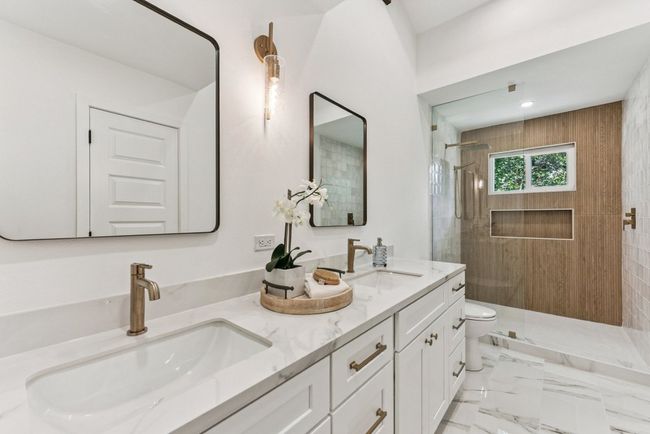 Indulge in a spa-style experience every day in this stunning ensuite. | Image 9