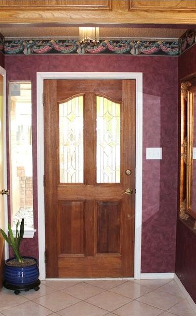 Foyer with light tile patterned floors | Image 2