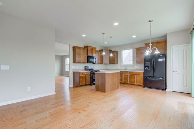 hearth / breakfast room view to kitchen | Image 20