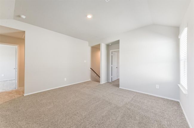 Upstairs offers a game room, 3 spacious bedrooms and a full bathroom. | Image 25