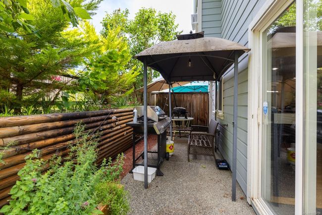 ABOVE GROUND LOWER LEVEL 22'X7'6 CONCRETE SLAB PATIO ACCESS FROM ABOVE GROUND FAMILY ROOM WVIA SLIDING GLASS DOOR AND MAN DOOR | Image 22