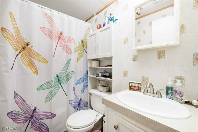 Full bathroom featuring vanity with upgraded ceramic sink and tub/shower combo. | Image 17