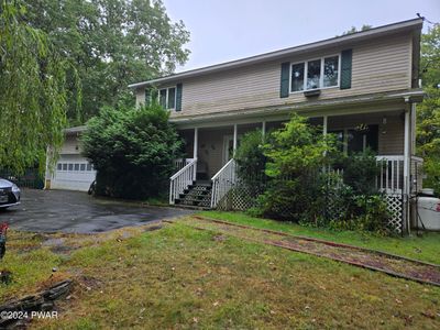 front of home | Image 1