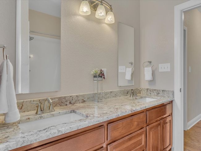 Bathroom featuring double vanity | Image 27