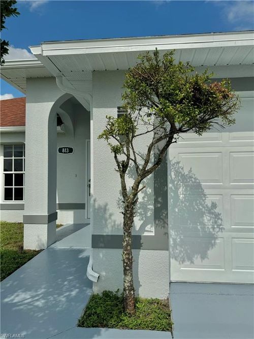 813 Naples Ave S, Lehigh Acres, FL, 33974-9438 | Card Image