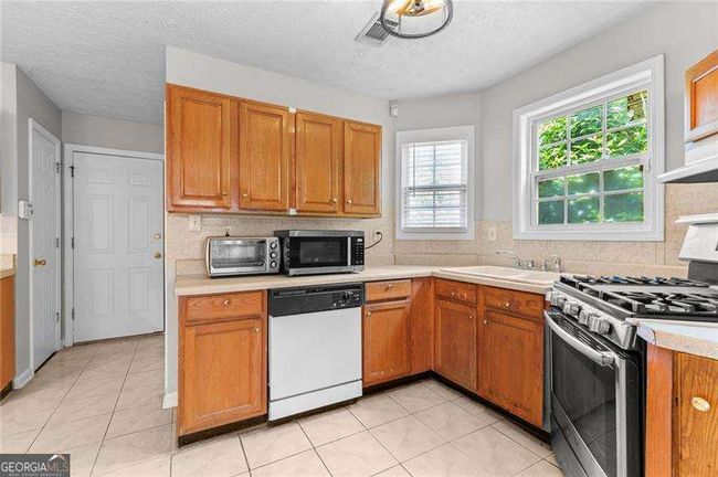 6416 Chestnut Glen Dr, House other with 4 bedrooms, 2 bathrooms and null parking in Norcross GA | Image 19