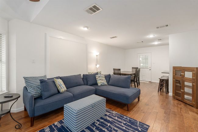 Fireplace is still available behind the wall panel behind the couch. | Image 8