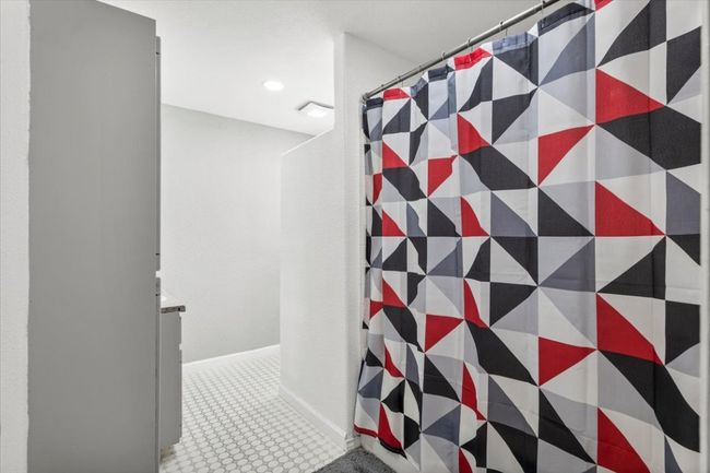Bathroom with curtained shower | Image 9