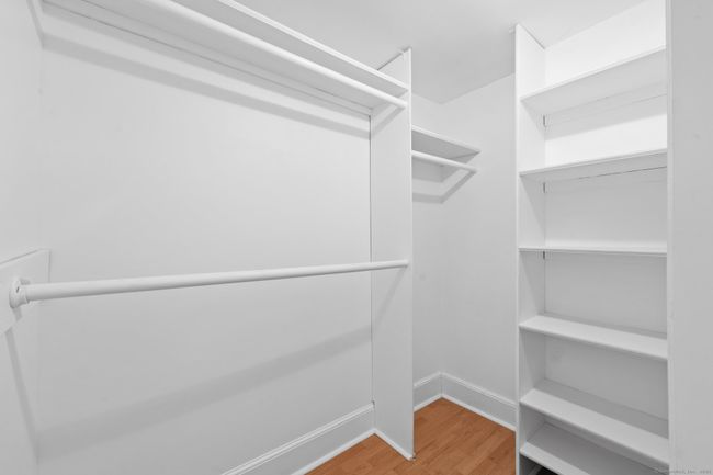 This bedroom has a walk-in closet. | Image 30