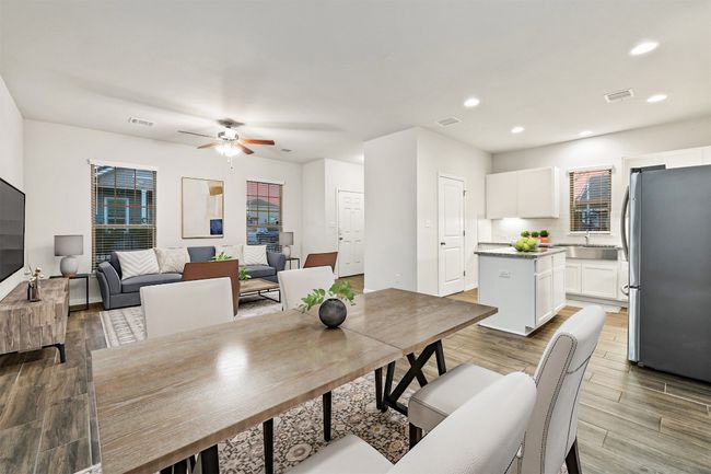 Dining room with visible vents, recessed lighting, and wood finished floors | Image 6