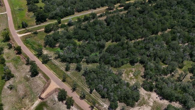 Road frontage and corner of property left of entry | Image 19