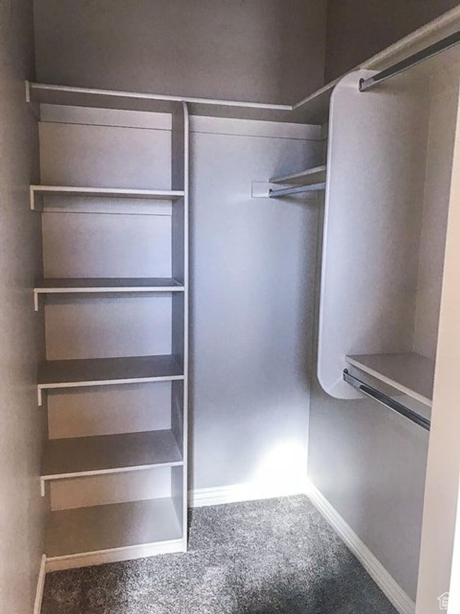 Spacious closet with carpet floors | Image 20