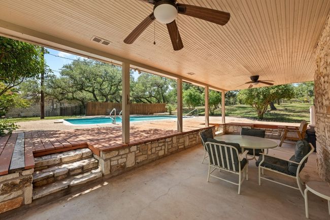 View of patio / terrace with ceiling fan and outdoor dining space | Image 22