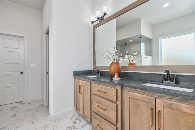 Bathroom featuring tile patterned flooring and double vanity | Image 27