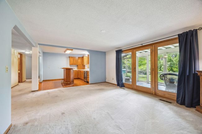 Open, walkout lower level living space. So many entertaining options!! | Image 15