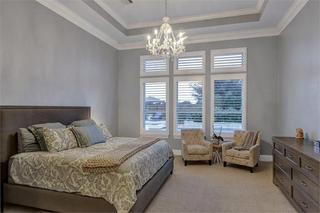 Amazing outdoor oasis view from your primary suite that connects you to a luxurious escape. | Image 23