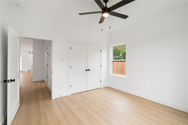 Guess what? 1st floor offers a bedroom with on-suite. So many possibilities... Mother -in law suite, home office, and so much more! | Image 17