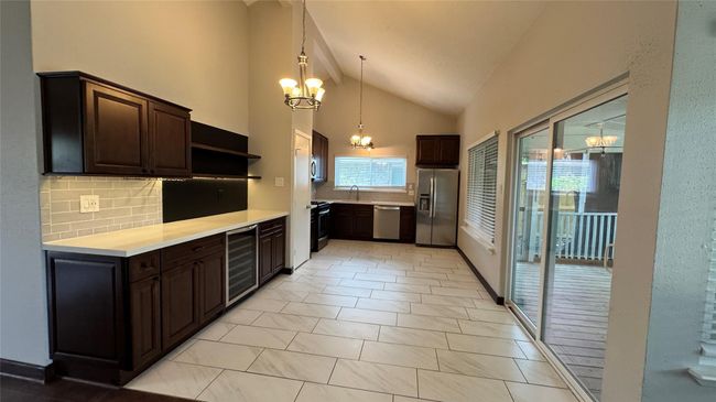 Imagine a space for your dining table with butler’s pantry for serving and a fantastic view of the outdoors! | Image 9