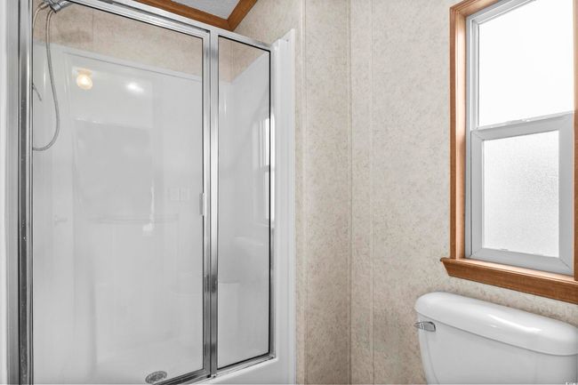Full bath with a stall shower and toilet | Image 20