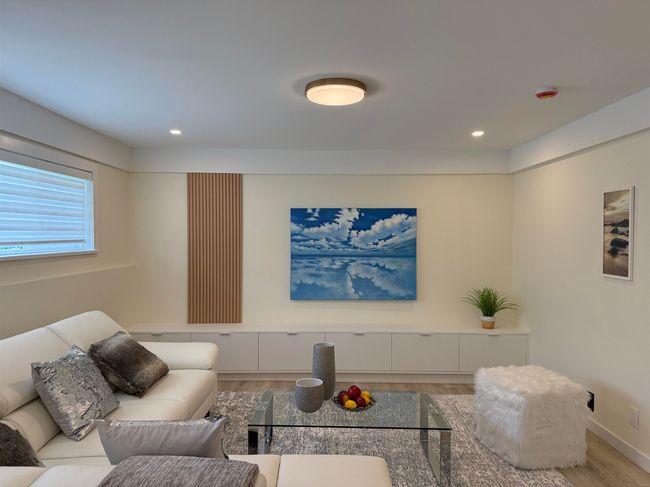 Living area featuring wood finished floors and recessed lighting | Image 16