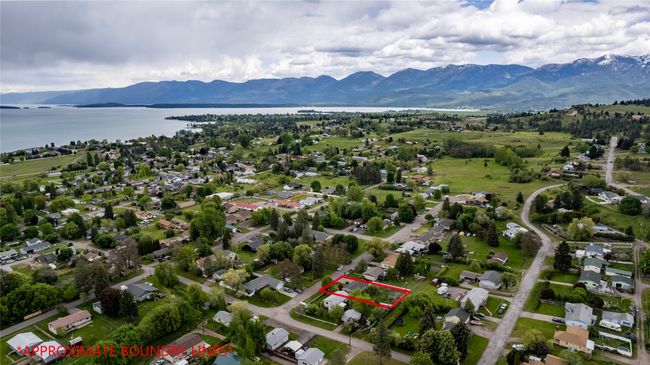 Aerial view featuring a water and mountain​​‌​​​​‌​​‌‌​‌‌​​​‌‌​​‌‌​‌​​​​​‌ view | Image 10