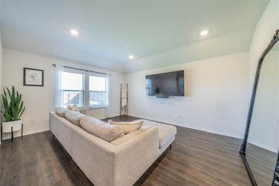 Living room featuring dark flooring. | Image 2