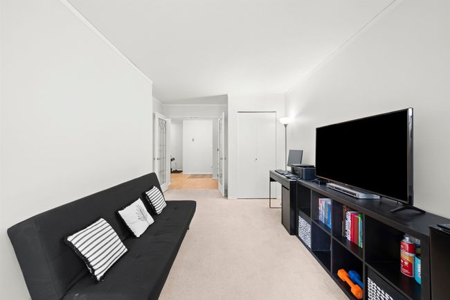 Living room featuring light colored carpet and ornamental molding | Image 28