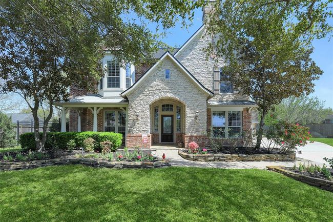Very updated home! Located on an interior street with lots of privacy features a 6 car garage, pool, spa, waterfall, stone slide and grotto, outdoor kitchen and a HUGE lot-recent roof! | Image 5