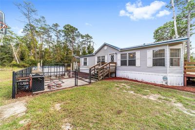 19702 Se 91 St Street, House other with 3 bedrooms, 2 bathrooms and null parking in Ocklawaha FL | Image 2