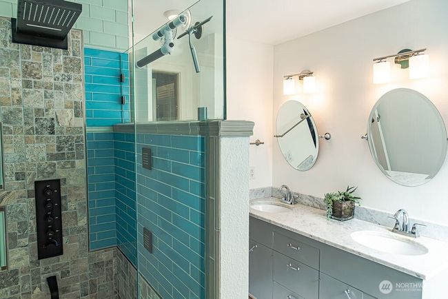 Custom spa-like shower in the primary suite. | Image 11