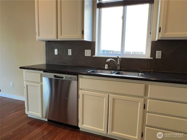 Dining room with view of the backyard. | Image 12