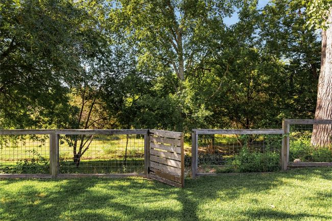 Gate access from the backyard to the greenspace, enjoy the privacy and wildlife! | Image 38