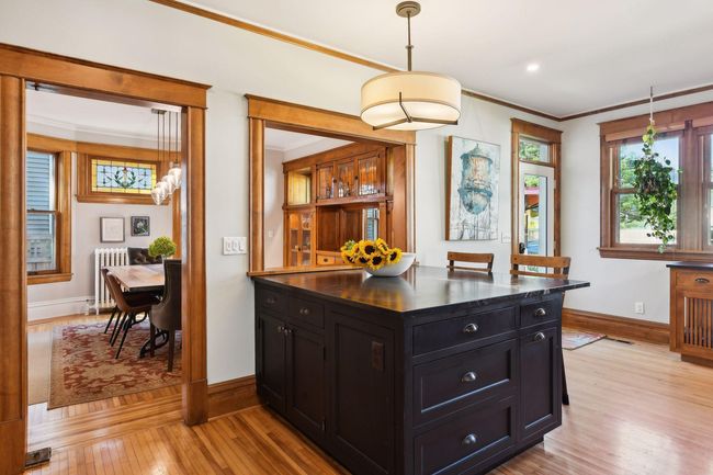 Wonderful pass through opens the space to the dining room. | Image 7