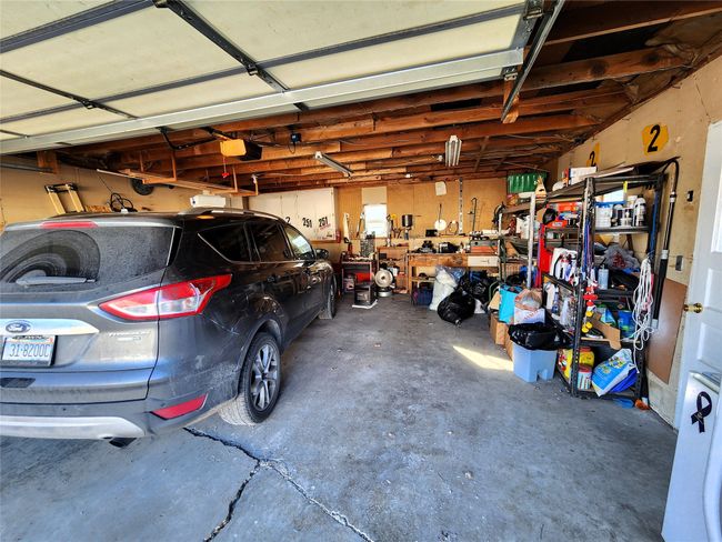 Garage featuring a garage door opener | Image 12