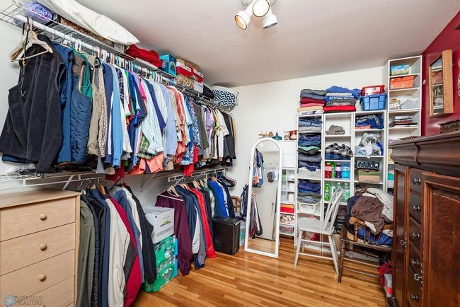 2nd Main Floor Bedroom Used as Primary Closet | Image 9