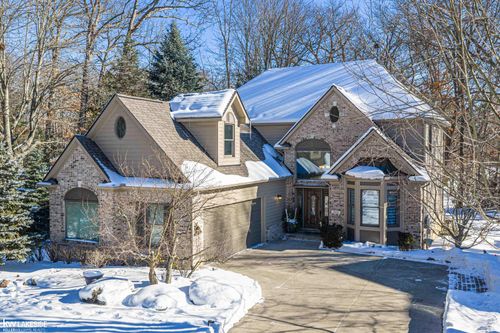 1440 Woodbridge Ln, Wixom, MI, 48393-1673 | Card Image