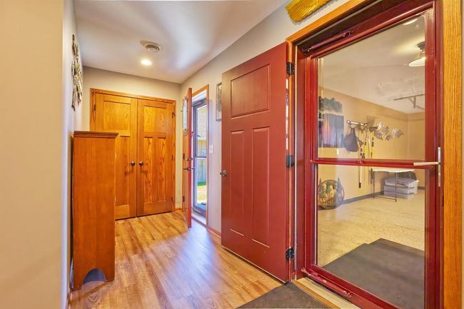 Front entrance and garage entrance. Nice closet space. | Image 4
