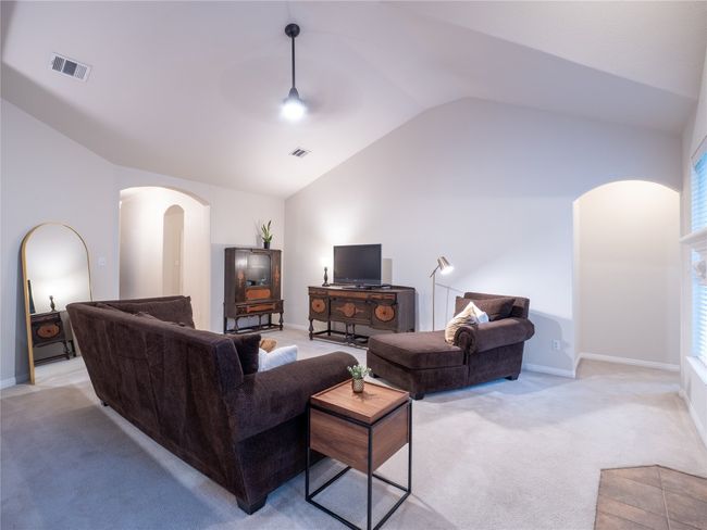 Living area featuring an open floor plan. | Image 6