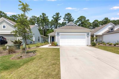 Side front entry has welcoming walk to front door. | Image 3